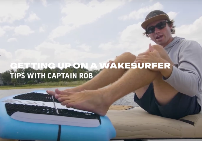 https://ronixwake.com/asset/66ce3f638d33e/GETTING-UP-ON-A-WAKESURFER-TIPS-WITH-CAPTAIN-ROB.jpg