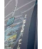 Ronix Supreme wakeboard graphic, top inset image of 8:12, showing the corner of the lenticular badge.