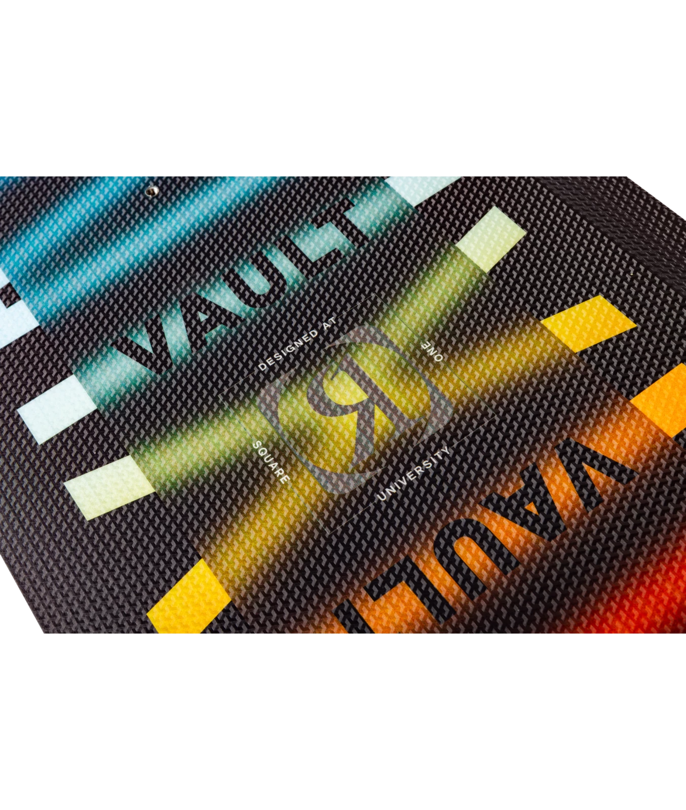 Top inset image of Ronix Men's Vault wakeboard, black board with color gradient. Image shows textured material annex material and Ronix/Vault logos.