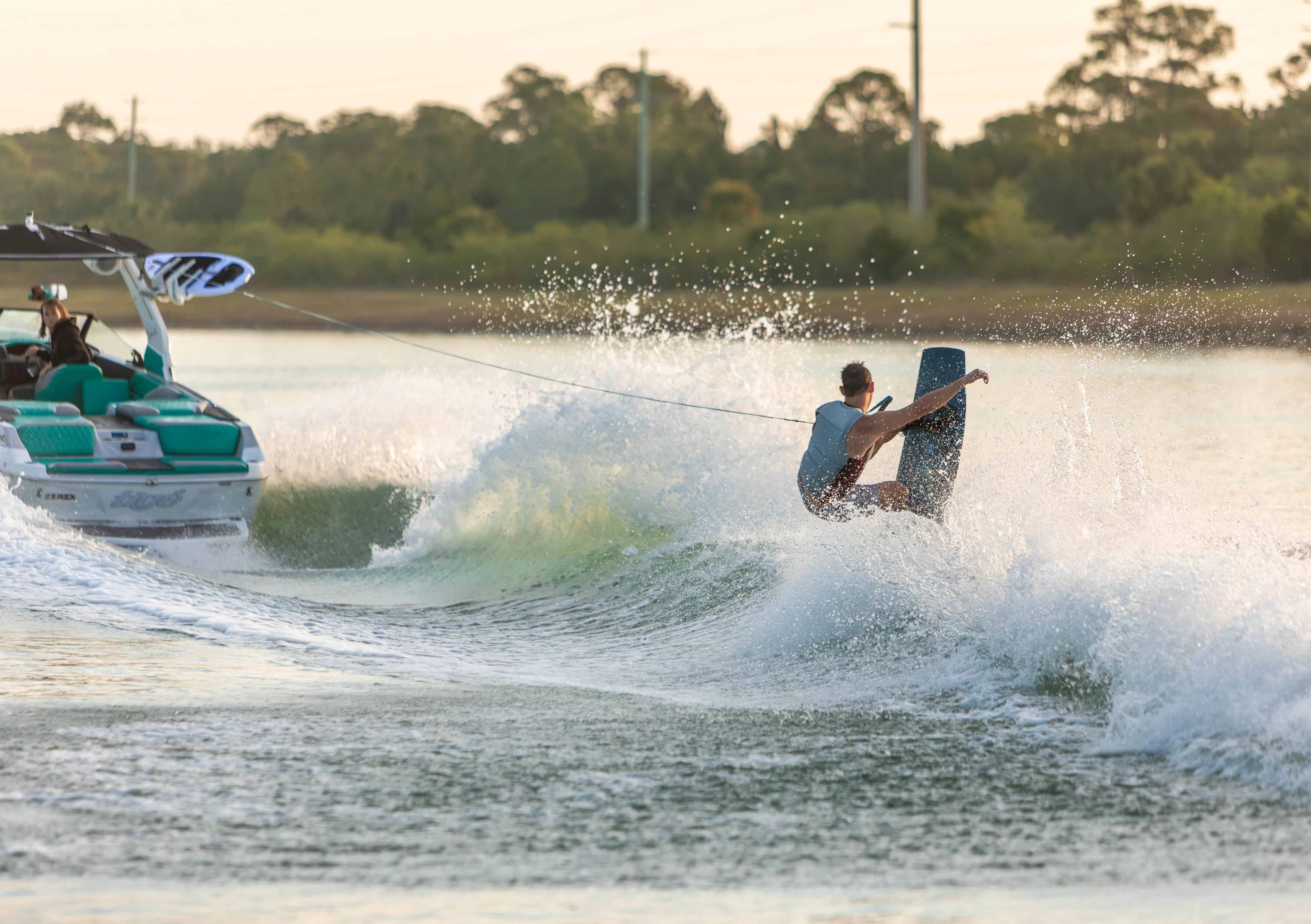 Action shot of Jake Pelot riding the Ronix Supreme wakeboard, shot in Florida